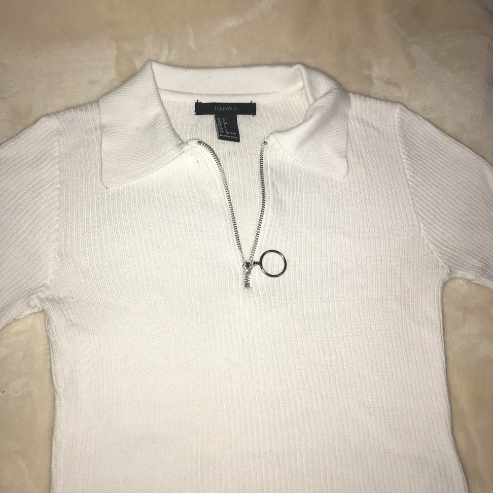 A white half zip up shirt